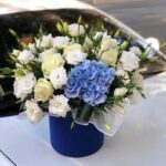 Bouquet of white hydrangea eustoma and avalanche roses